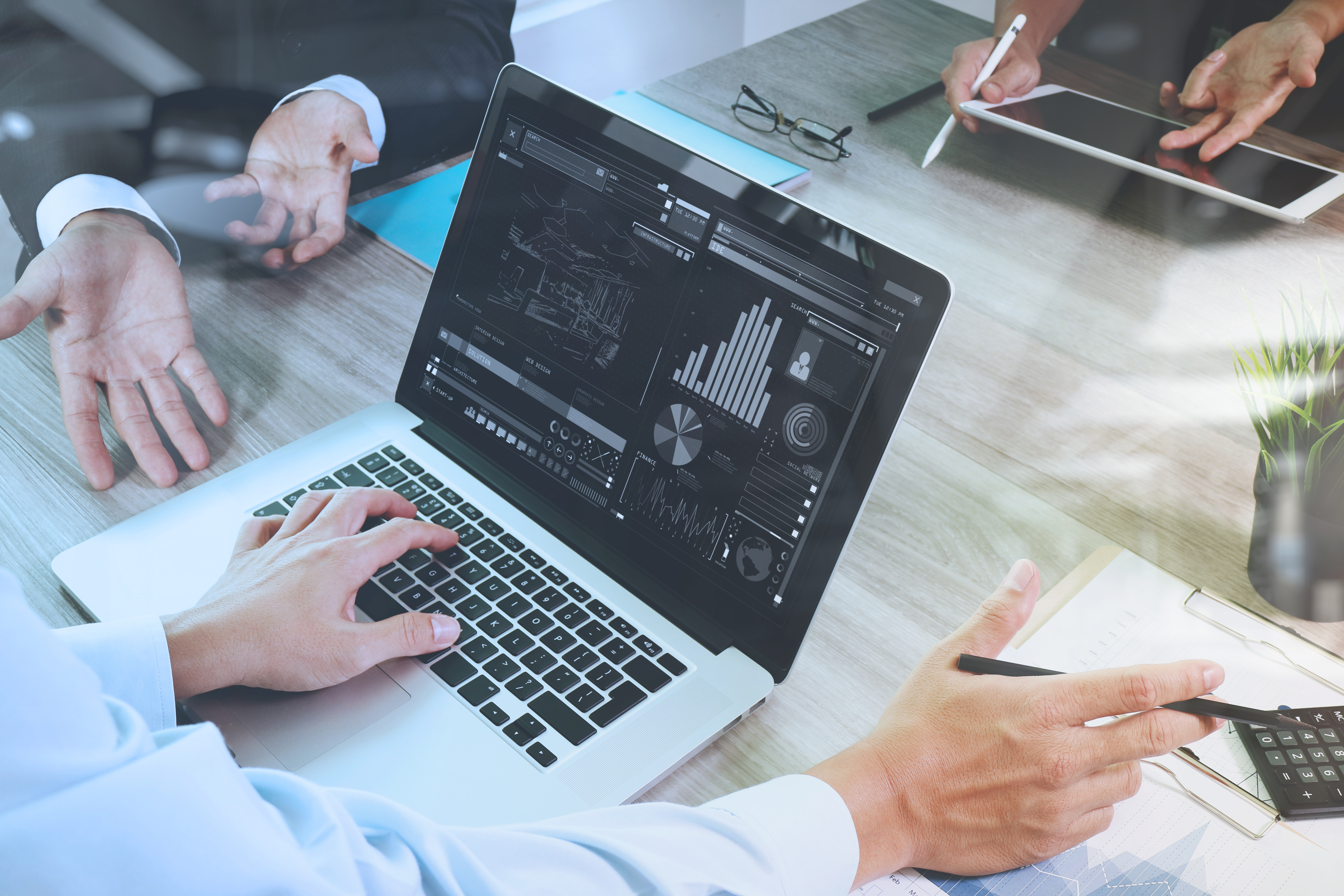 business documents on office table with smart phone and laptop compute